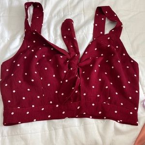 Brand new polka dot top with zipper in the back